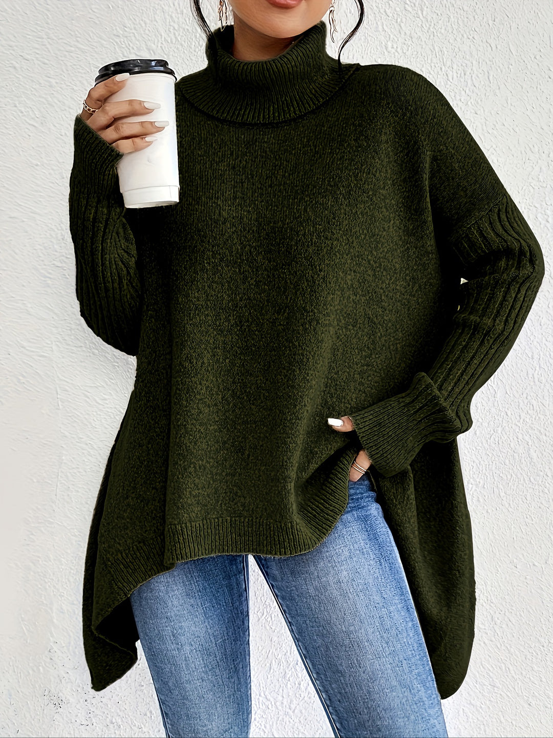 Women's oversized knit sweater with high turtleneck, ribbed sleeves, and asymmetric hem Mune Fashion