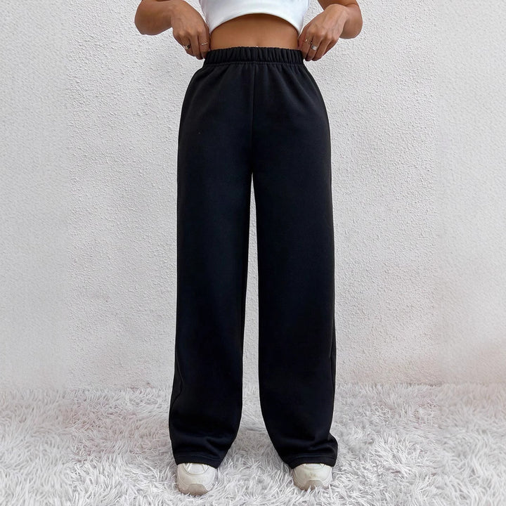 Women's wide lounge pants made of French Terry with high comfort waistband, side insert pockets and flowing legs Mune Fashion