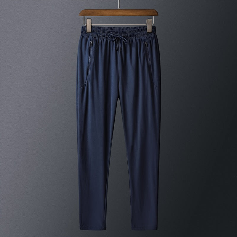 Men's sporty training pants with practical zip pockets Mune Fashion