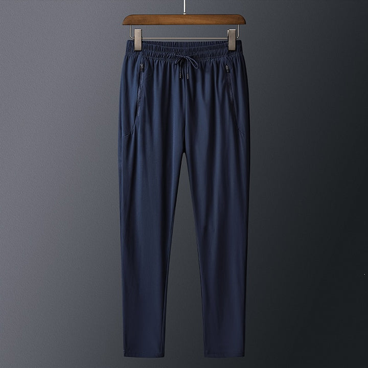 Men's sporty training pants with practical zip pockets Mune Fashion