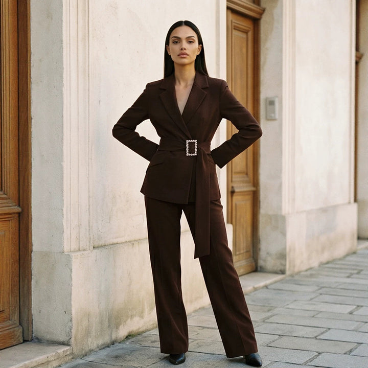 Ladies fitted wrap blazer with pearl belt buckle and slim suit trousers Mune Fashion