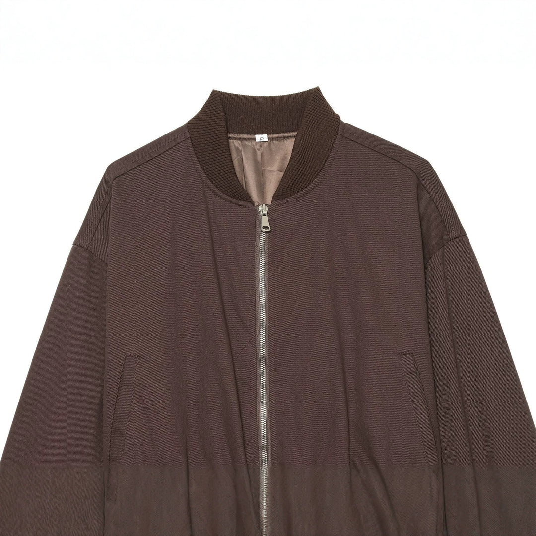 Women's cropped bomber jacket with wide ribbed waistband, metal zipper, and oversized sleeves Mune Fashion