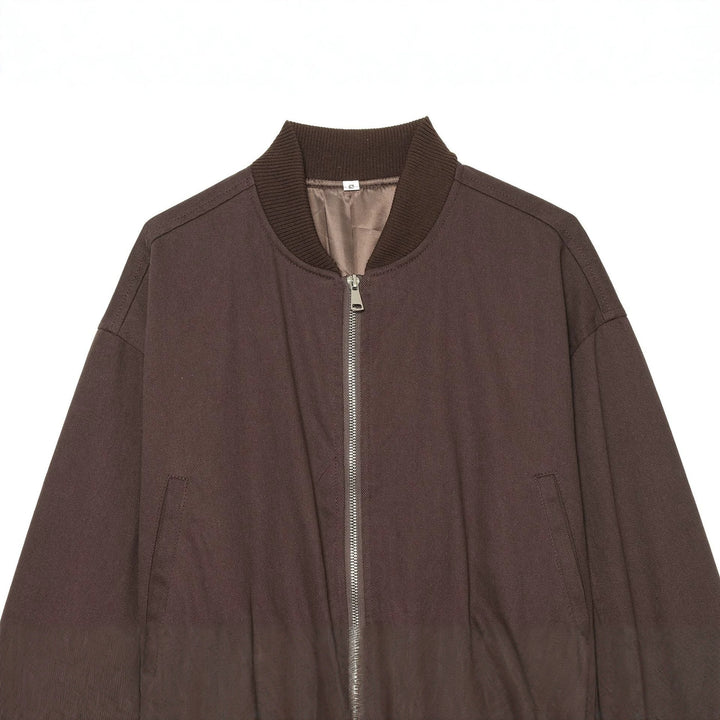 Women's cropped bomber jacket with wide ribbed waistband, metal zipper, and oversized sleeves Mune Fashion