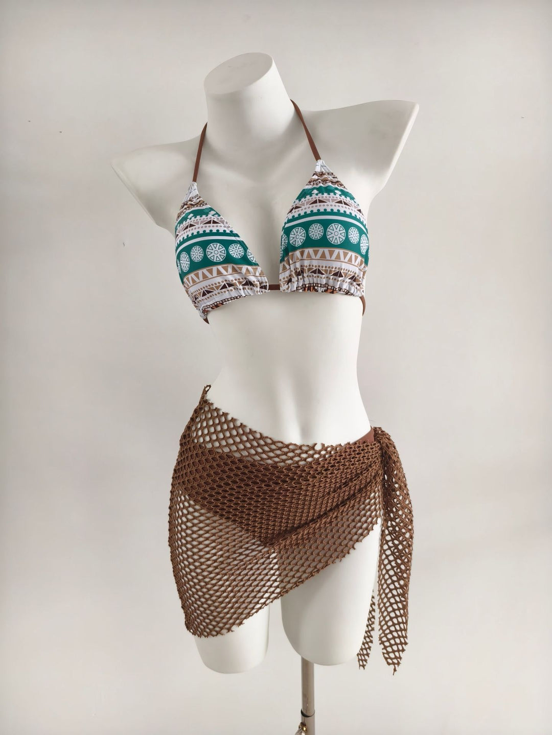 Ladies triangle bikini with trendy net skirt details Mune Fashion