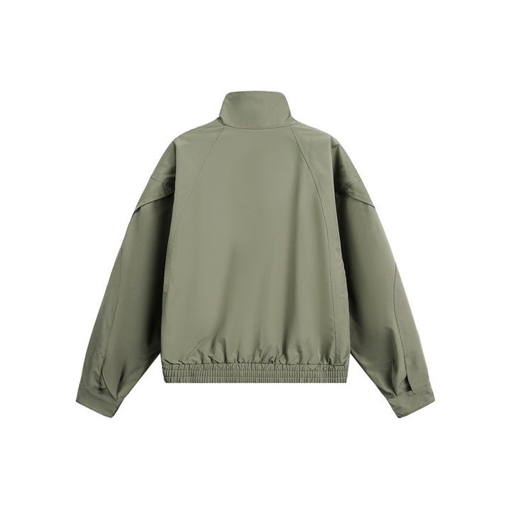 Unisex short jacket in minimalist tech fabric with funnel collar and concealed front placket Mune Fashion