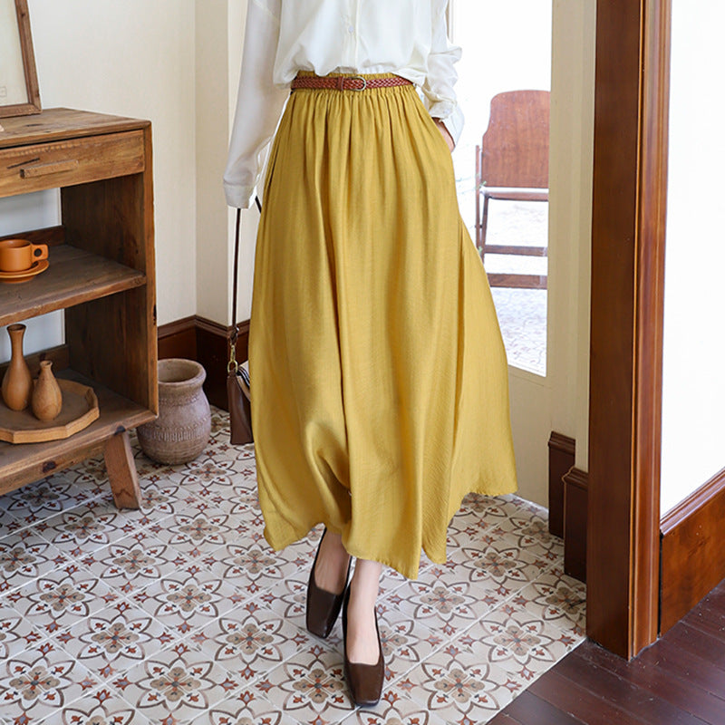 Women's flowing maxi skirt with elastic waistband and braided leather-look belt Mune Fashion