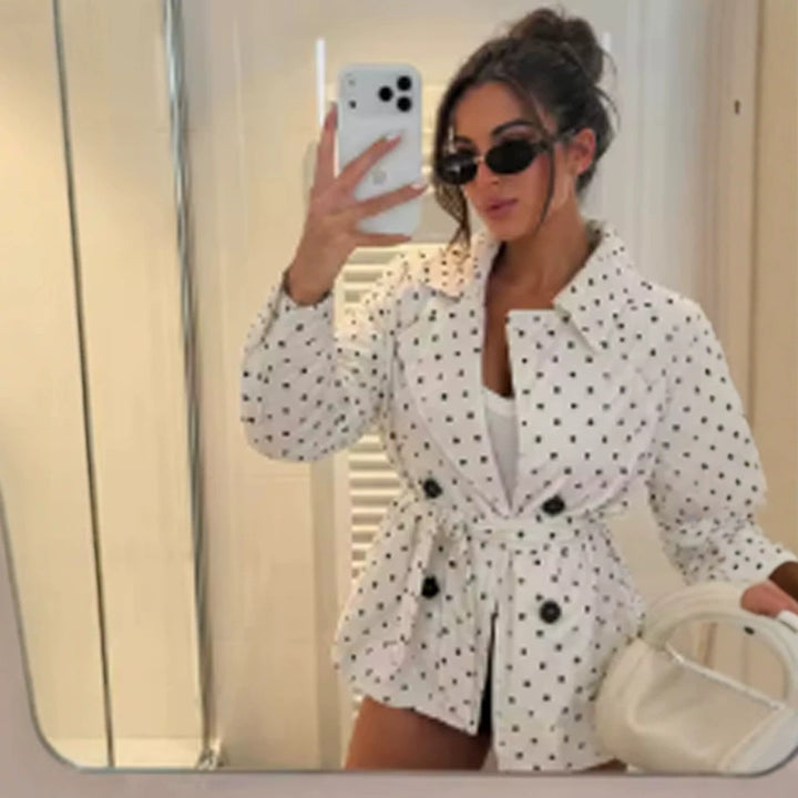 Women’s short trench coat with double breasted front, belt at the waist and polka dot print Mune Fashion
