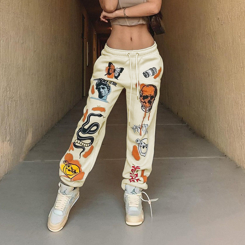 Women's graphic joggers with a high waistband, drawstring, and streetwear prints Mune Fashion