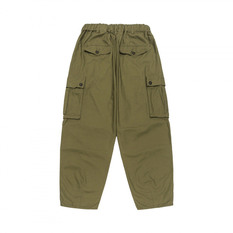 Unisex Oversize Cargo Pants with drawstring waistband, layer detail and snap hem Mune Fashion