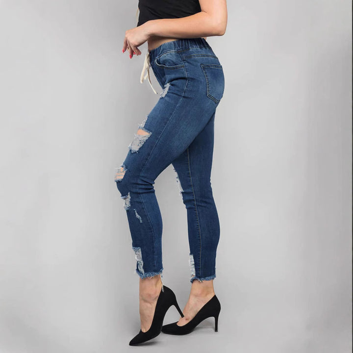 Women High-Waisted Destroyed Jogger Jeans with Elastic Drawstring Waistband and Cropped Frayed Hem Mune Fashion