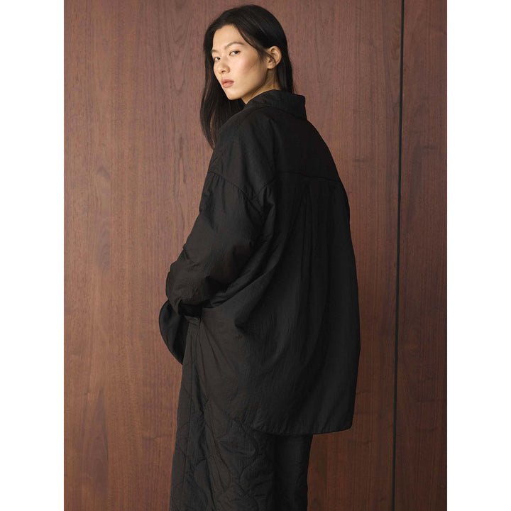 Women's loosely cut quilted oversized shirt jacket with kent collar and concealed button placket Mune Fashion