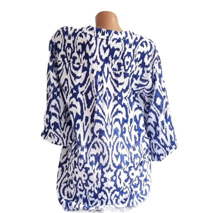 Women nan locker cut tunic blouse with Ikat pattern, V-neck and three-quarter sleeves Mune Fashion