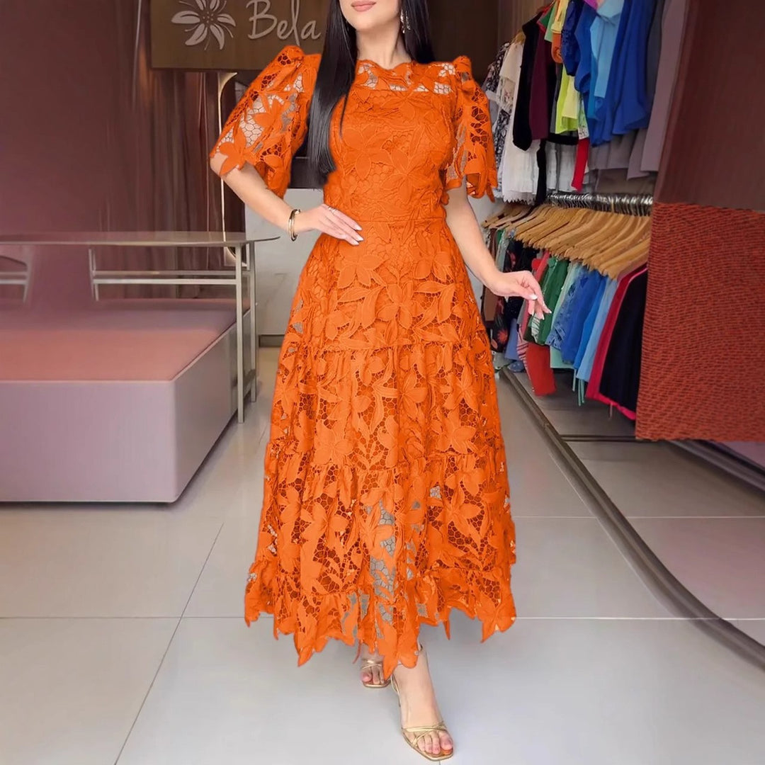 Women's maxi dress made of floral guipure lace with a fitted silhouette and tiered hem Mune Fashion