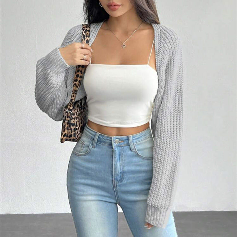 Women's short bolero made of coarse ribbed knit with oversized sleeves Mune Fashion