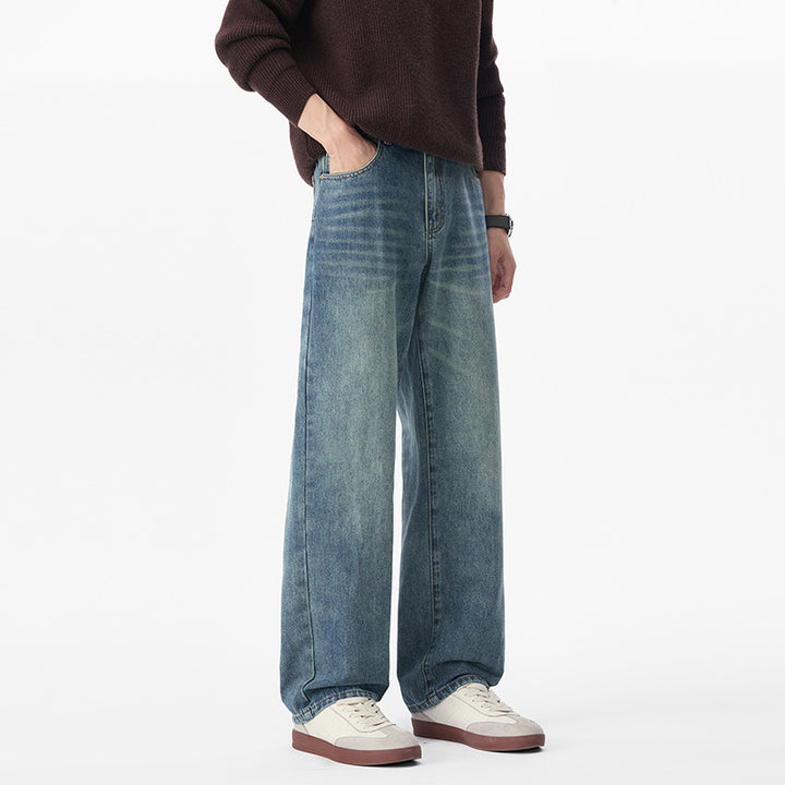 Men's baggy jeans made of heavy denim with a light used finish and a low crotch.