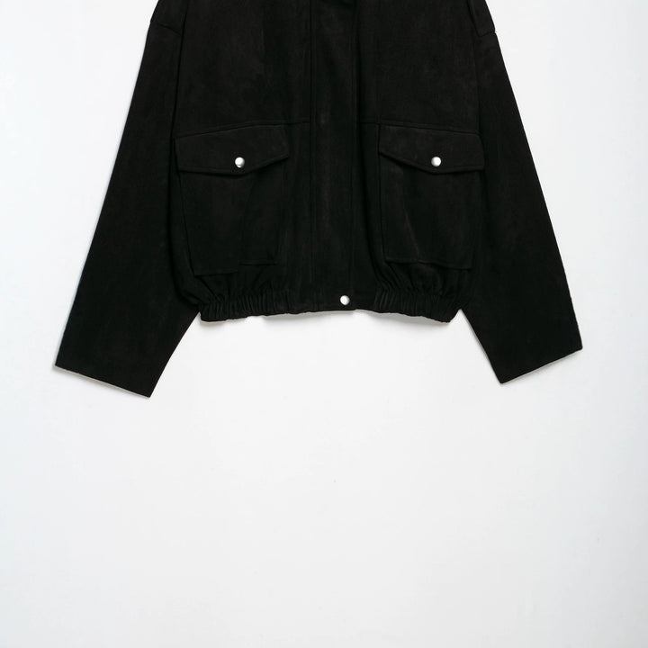 Women's tailored velvet bomber jacket with stand-up collar, shoulder epaulettes, and large flap pockets