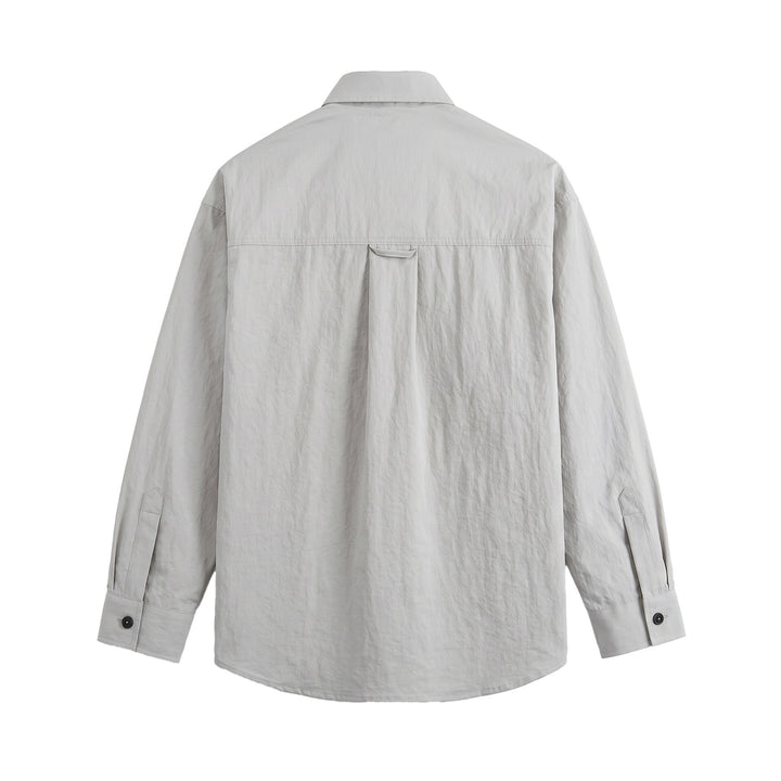 Men's utility shirt jacket with an oversized fit, patch pockets, and concealed button placket Mune Fashion