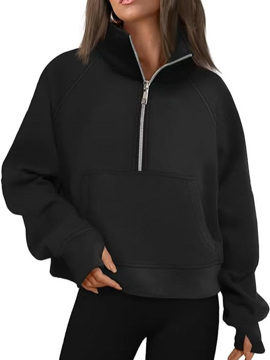 Women’s oversized half-zip sweater with kangaroo pocket, thumb holes, and high collar Mune Fashion