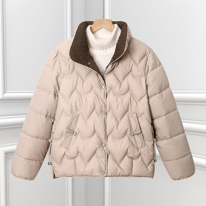 Women's short quilted puffer jacket with decorative curved quilting and snap button placket Mune Fashion