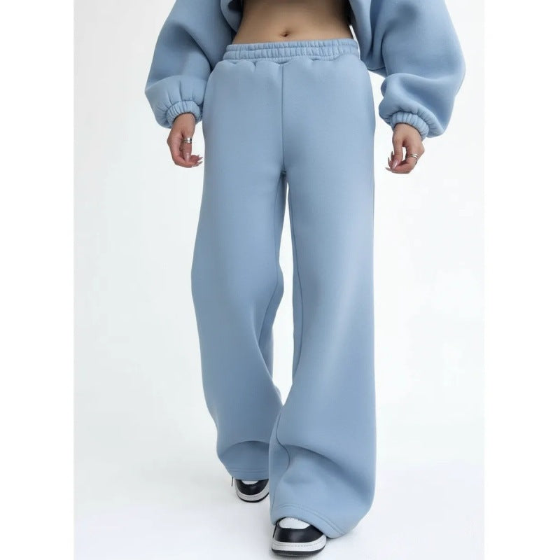 Women's flowing palazzo lounge pants with extra wide leg, elastic comfort waistband, and discreet side pockets Mune Fashion