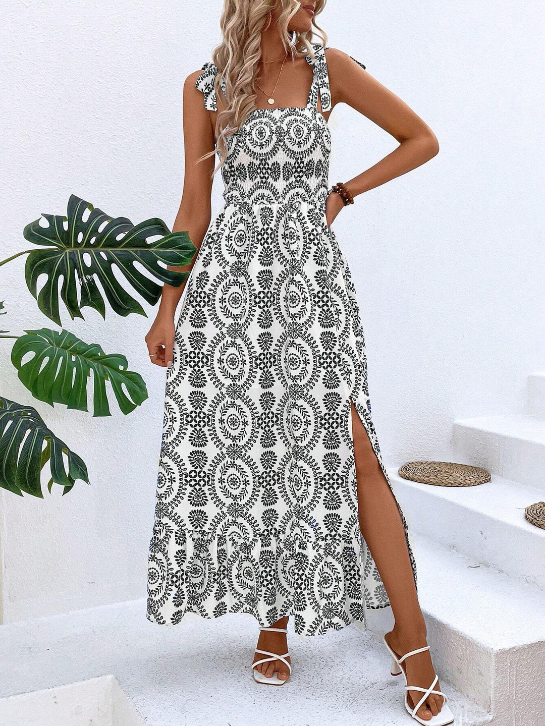 Women's maxi dress with smocked bustier, tie straps, and side leg slit Mune Fashion