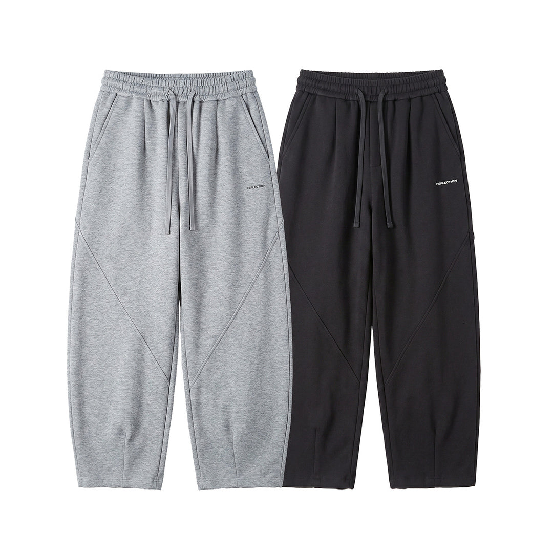 Men's loosely cut joggers with drawstring, decorative seams, and side pockets Mune Fashion
