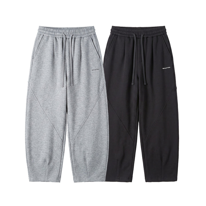 Men's loosely cut joggers with drawstring, decorative seams, and side pockets Mune Fashion
