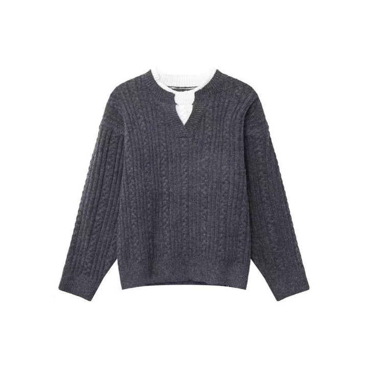 Women's chunky knitted cable pattern sweater with V-neck and layered look Mune Fashion