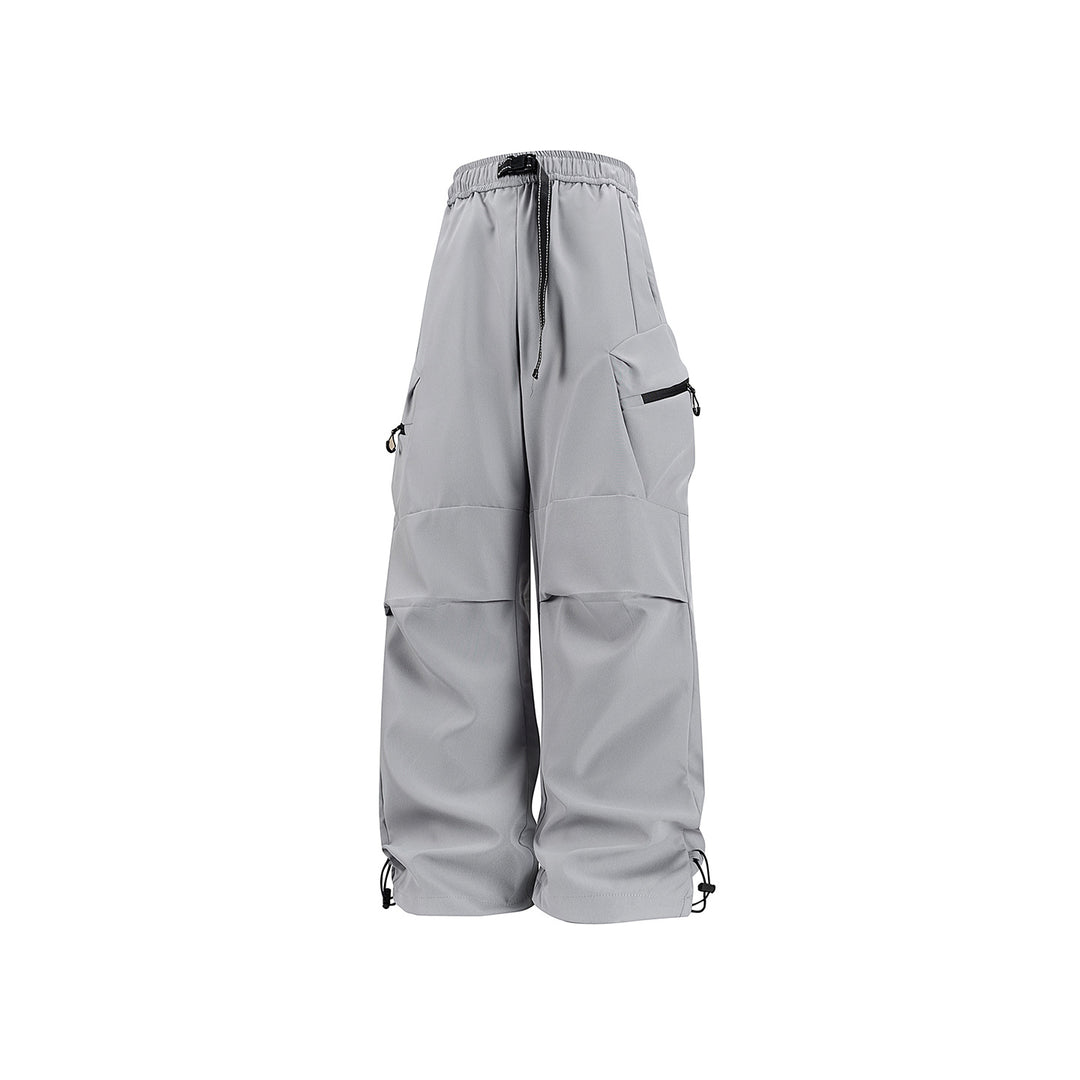Damen Weite Utility-Cargo-Hose mit Tunnelzugbund, Reißverschluss-Taschen und verstellbaren Beinabschlüssen Mune Fashion
