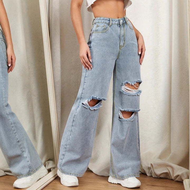 Ladies high-waisted baggy jeans in wide-leg with multi-level knee cutouts Mune Fashion