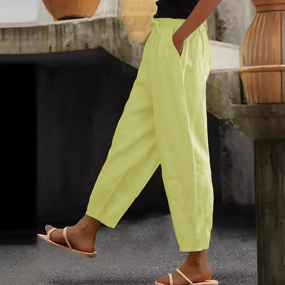 Women's loose-fitting linen blend pants with elastic waistband, drawstring, and angled side pockets Mune Fashion