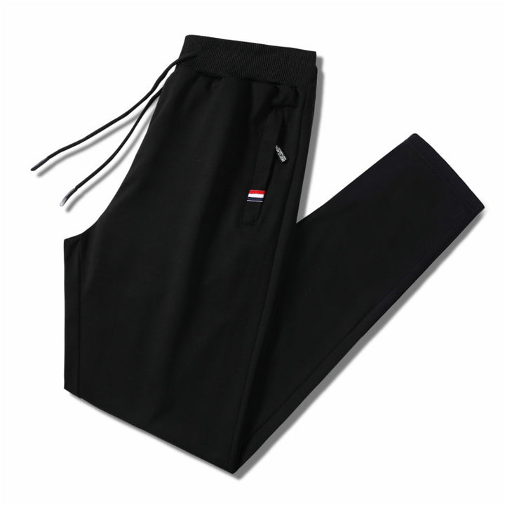 Men's Slim-Fit Jogging Pants with Elastic Ribbed Waistband, Drawstring and Zipper Pockets Mune Fashion