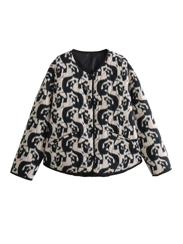 Ladies' quilted short jacket with abstract textured print, lightweight thermal padding, and contrasting piping Mune Fashion