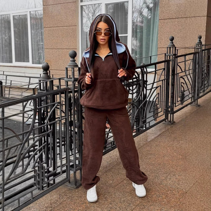 Women's fleece loungewear set with half front zip, lined hood and high cut comfort pants Mune Fashion