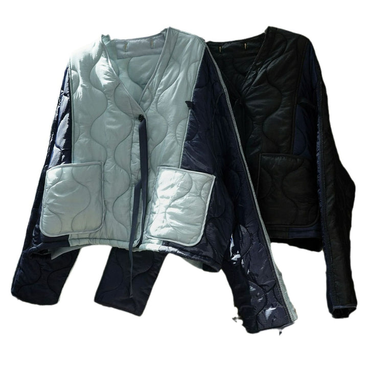 Women's Padded Oversized Quilted Jacket with Contrasting Sleeves and Button Placket Mune Fashion