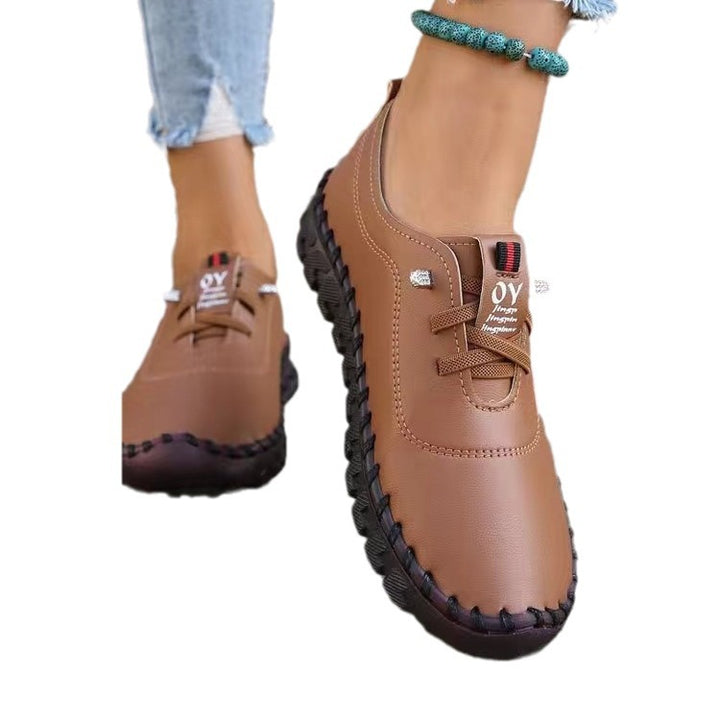 Women's hand-sewn moccasin loafers with elastic lacing, padded comfort insole, and patterned rubber sole Mune Fashion