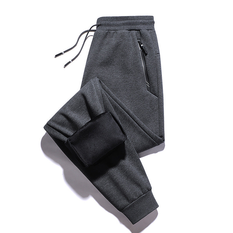 Men's thermo fleece jogging pants with brushed inner side, reflective zipper pockets and drawstring waistband Mune Fashion