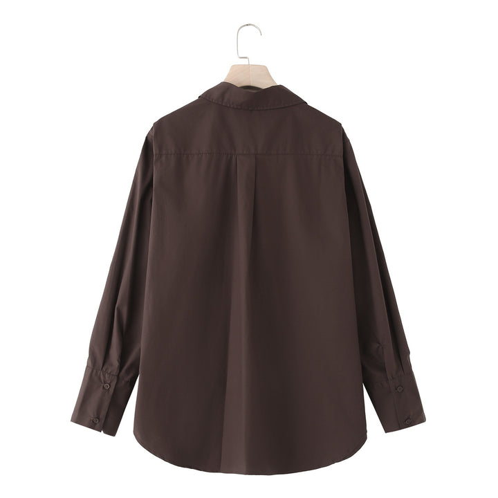 Women 20+ casual oversized blouse with shirt collar, complete button placket and extended back Mune Fashion