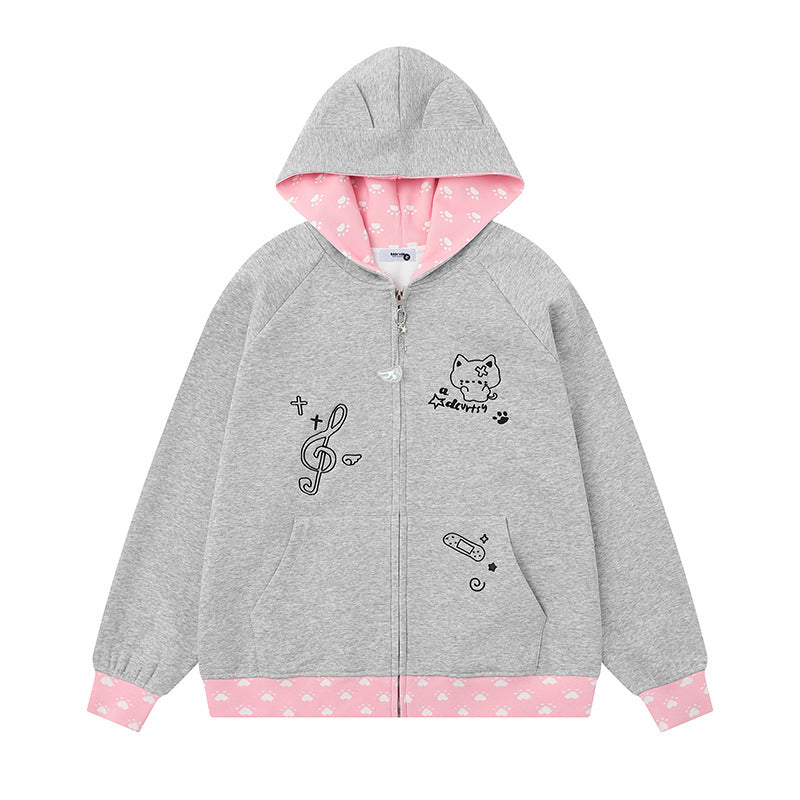 Women's hoodie with zipper in casual kawaii style, contrast hood, comic prints and ribbed cuffs Mune Fashion