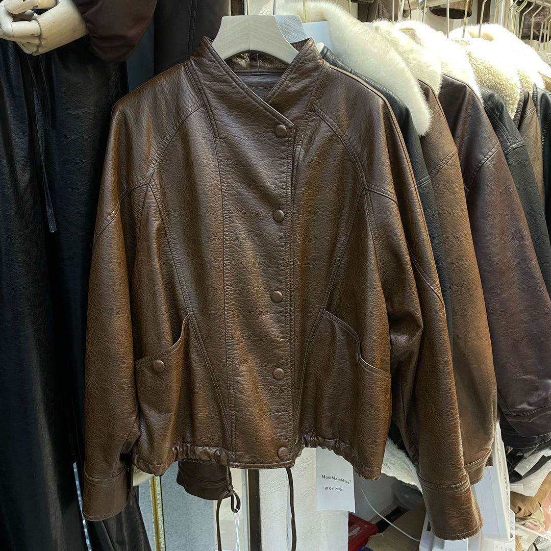 Women Short Leather Jacket with textured grain, stand-up collar, and drawstring waistband Mune Fashion