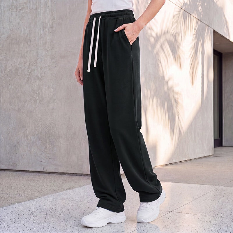 Women's wide lounge palazzo pants with high comfort waistband, drawstring, side pockets, and decorative side seam Mune Fashion