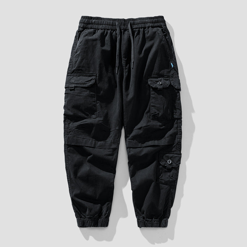 Herren Leichte Canvas-Cargohose im Joggerstil mit elastischem Bund, segmentierten Kniepaneelen und verdeckten Klappentaschen Mune Fashion