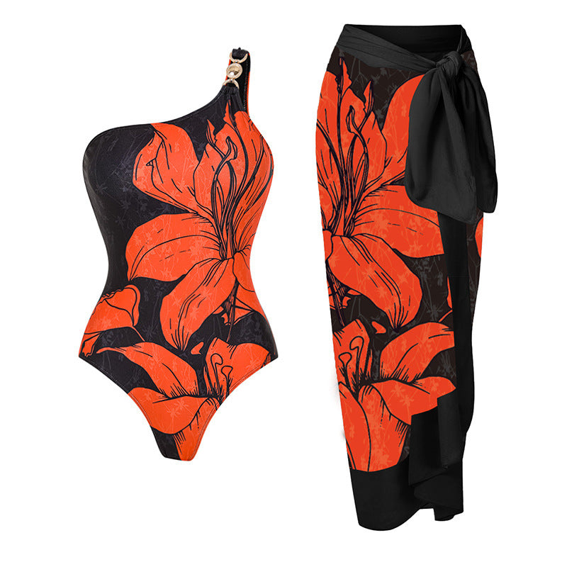Women's swimsuit with asymmetric cut and floral accents Mune Fashion