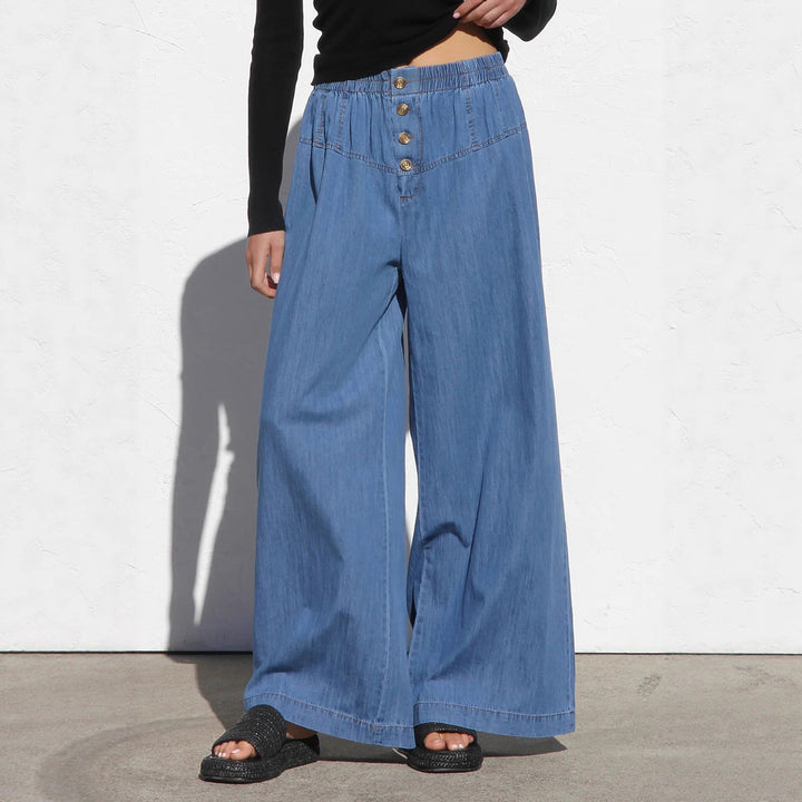 Women's wide high-waisted jeans with elastic waistband and decorative button placket Mune Fashion