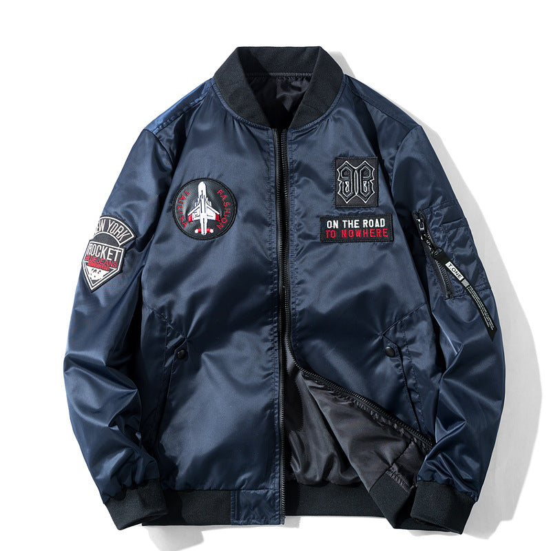 Men's  pilot-style embroidered patch utility bomber jacket with angled welt pockets and zip sleeve pocket Mune Fashion