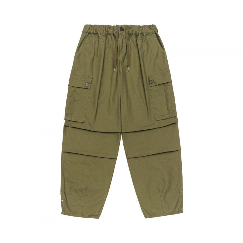 Unisex Oversize Cargo Pants with drawstring waistband, layer detail and snap hem Mune Fashion