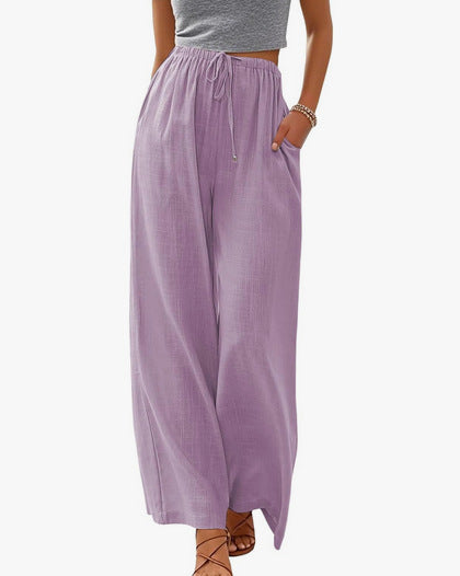 Women's wide linen pants with elastic waistband, drawstring, and side pockets Mune Fashion
