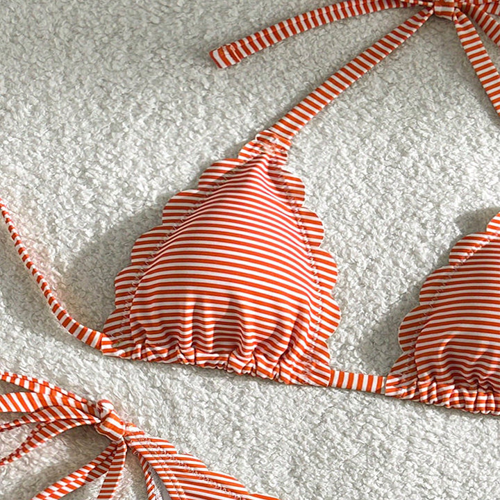 Women's triangle bikini with playful ruffle design and tie straps
