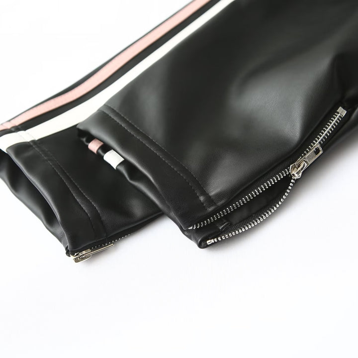 Ladies nan sporty faux leather jacket with bow appliqué and contrasting side stripes Mune Fashion