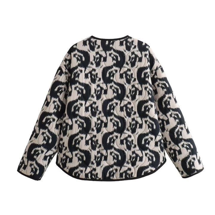 Ladies' quilted short jacket with abstract textured print, lightweight thermal padding, and contrasting piping Mune Fashion